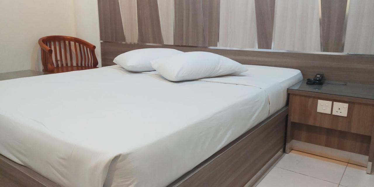 טאנג'ונג פינאנג Paradise Hotel מראה חיצוני תמונה