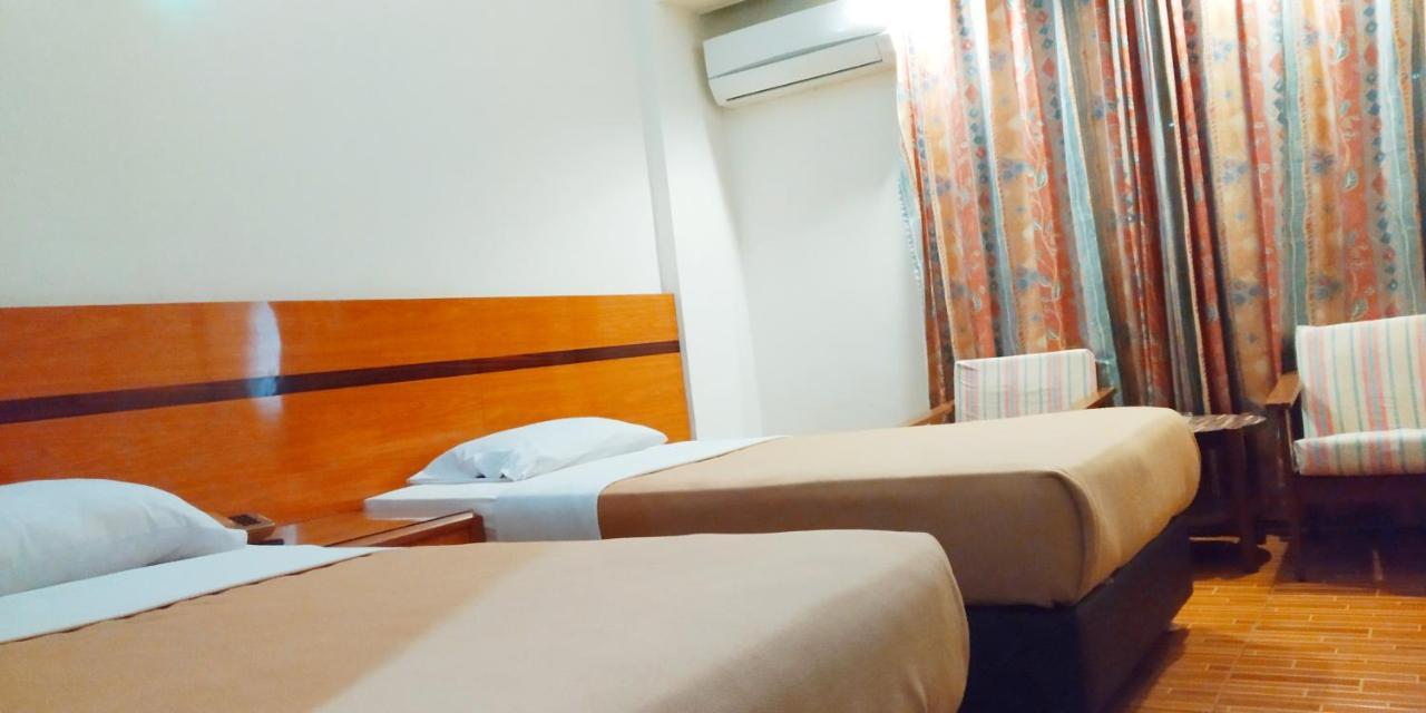 טאנג'ונג פינאנג Paradise Hotel מראה חיצוני תמונה