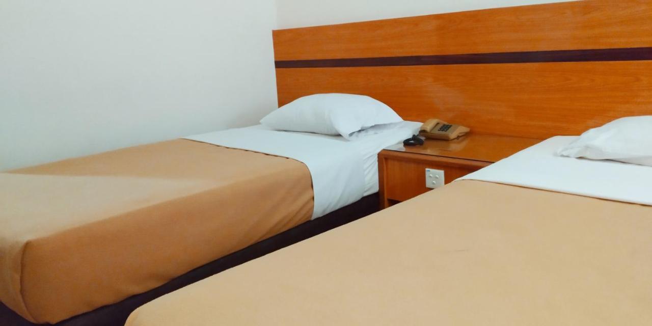 טאנג'ונג פינאנג Paradise Hotel מראה חיצוני תמונה